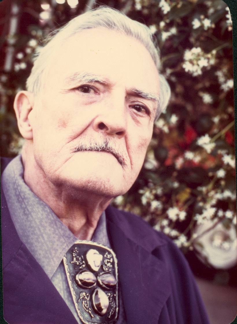 Milton H. Erickson, MD, wearing a shell bolo tie